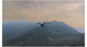 UAV in the sky over rain forest